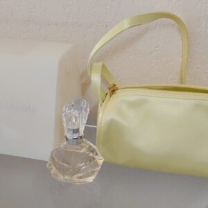 COFFRET SAC + ESSENCE EXCITING EDT Vapo 50 ML de VERSACE